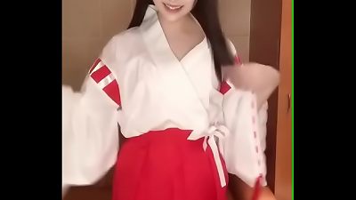 changing live into a miko (shrine maiden) costume