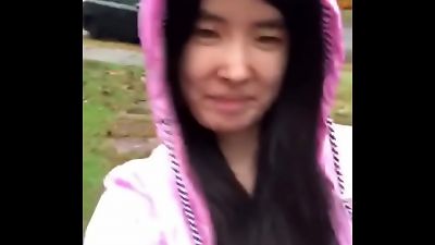 asian teen publicly unveils herself in the rain!