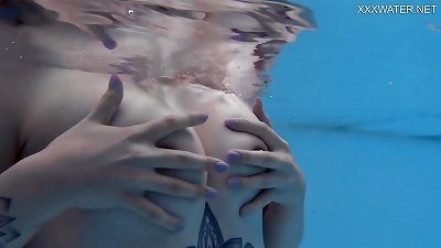 adorable ash-blonde Finnish pornstar Mimi Cica underwater