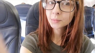 adorable porn industry star fingers herself in airplane bathroom