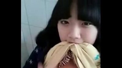 saucy teenie chinese demonstrating funbags and clit in public rest room